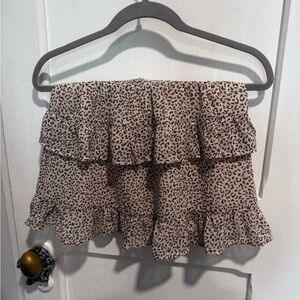 small cheetah print skirt with three layers of ruffles slip skirt underneath